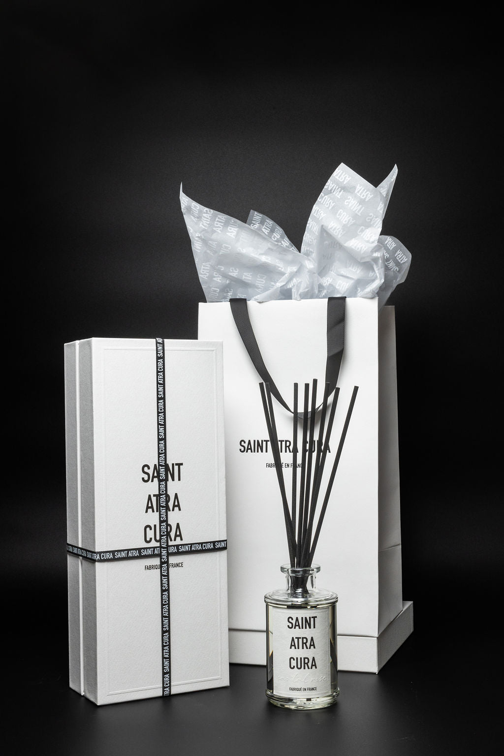 Small Diffuser - Santal Rose (250ml) Glass. Luxury Diffuser by Saint Atra Cura. Reed Diffuser. Home Decor. Scent. Fragrance. Luxury packaging, gifting, beautiful presentation. 

Top Notes: Pink Peppercorn, Raspberry
Middle Notes: Rose, Iris, Magnolia
Base Notes: Amber, Musk, Patchouli